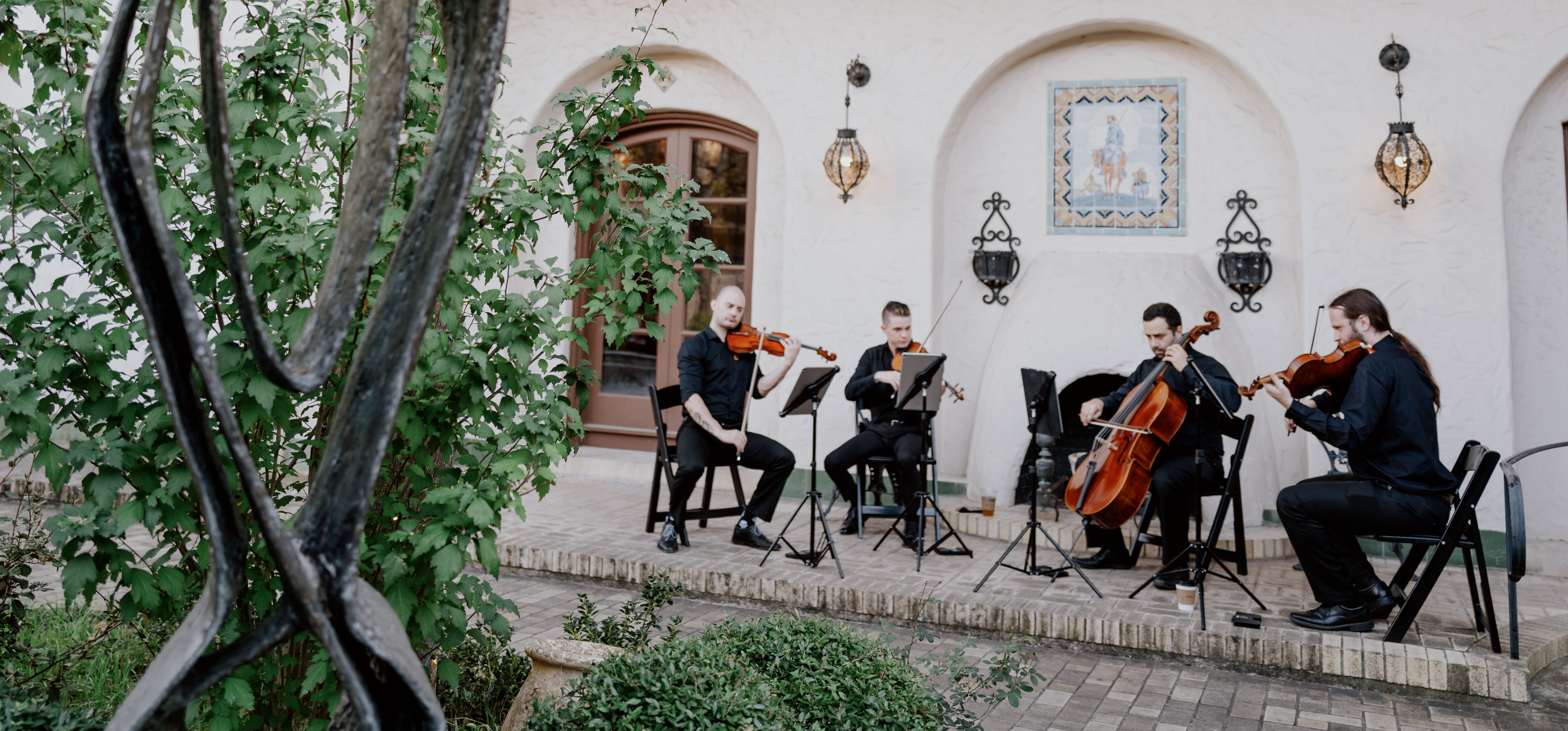 Triforce Quartet performing at a wedding reception at an Art Museum